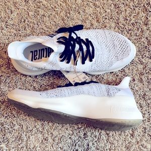 Adidas never worn woman’s running shoe.  Futurenatural 8.5